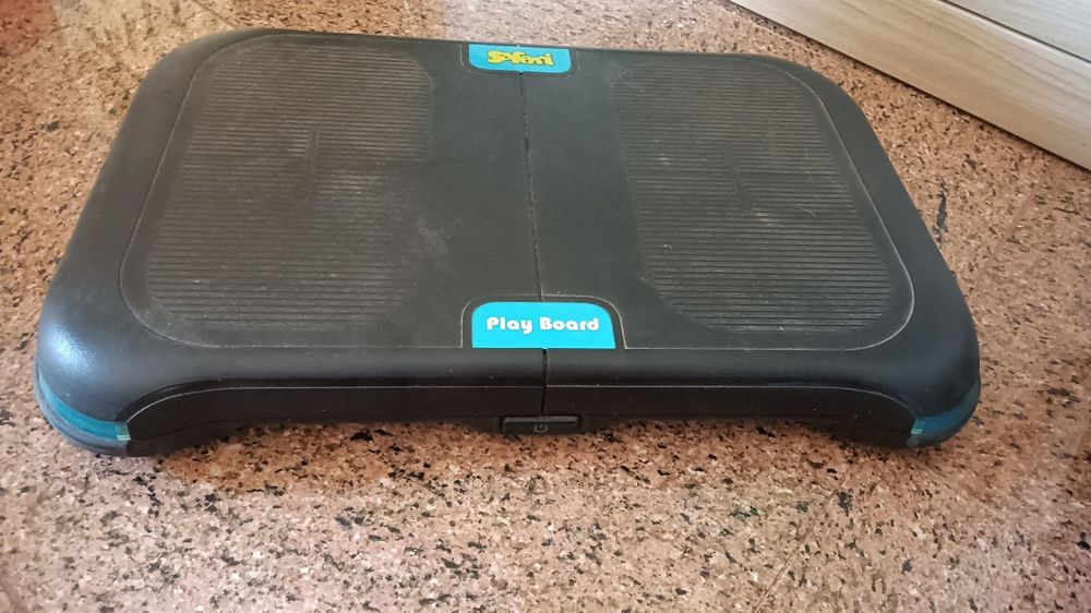 Wii com balança e um comando