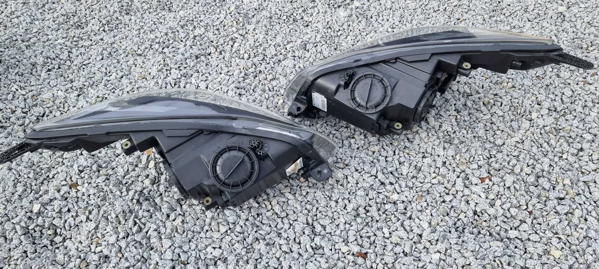 Lampy bi xenon Opel Insignia A skrętne regenerowane reflektory HELLA