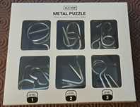 Puzzle com peças metálicas (novo)