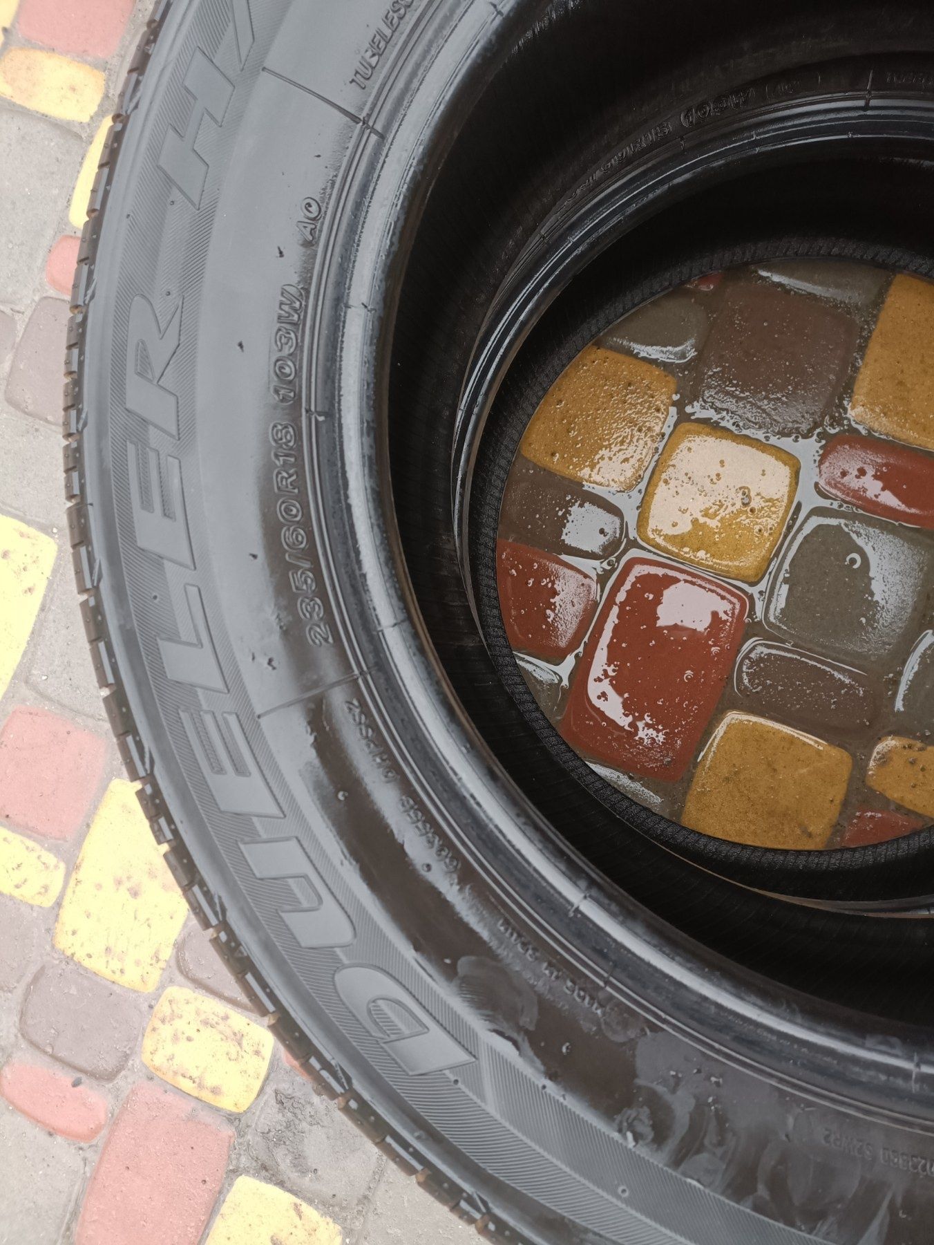 Шини Bridgestone 235/60 R18 резина літня