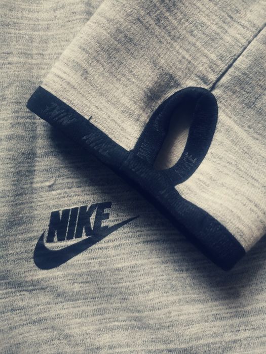 Bluza Nike r. S Asymetryczna, z tyłu dłuższą, zapinana na zamek
