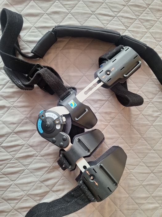 Orteza stawu łokciowego lewego z zegarem ÖSSUR z instrukcją