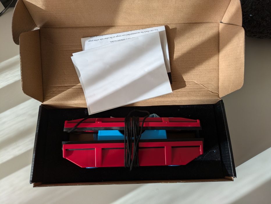 Tirolês magnético para limpar vidros