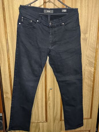 Продам нові чоловічі джинси Brax 34/32