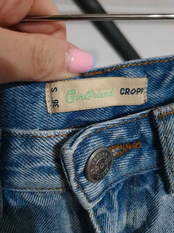 Wycierane spodnie z dziurami Cropp rozm 36