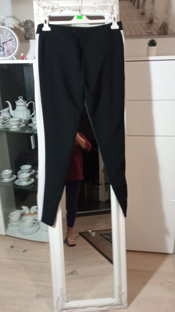 Spodnie damskie Reserved z lampasami jak nowe rozmiar 38