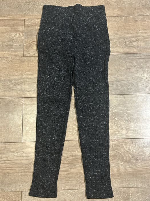 Piękne nowe błyszczące święcące legginsy push up L