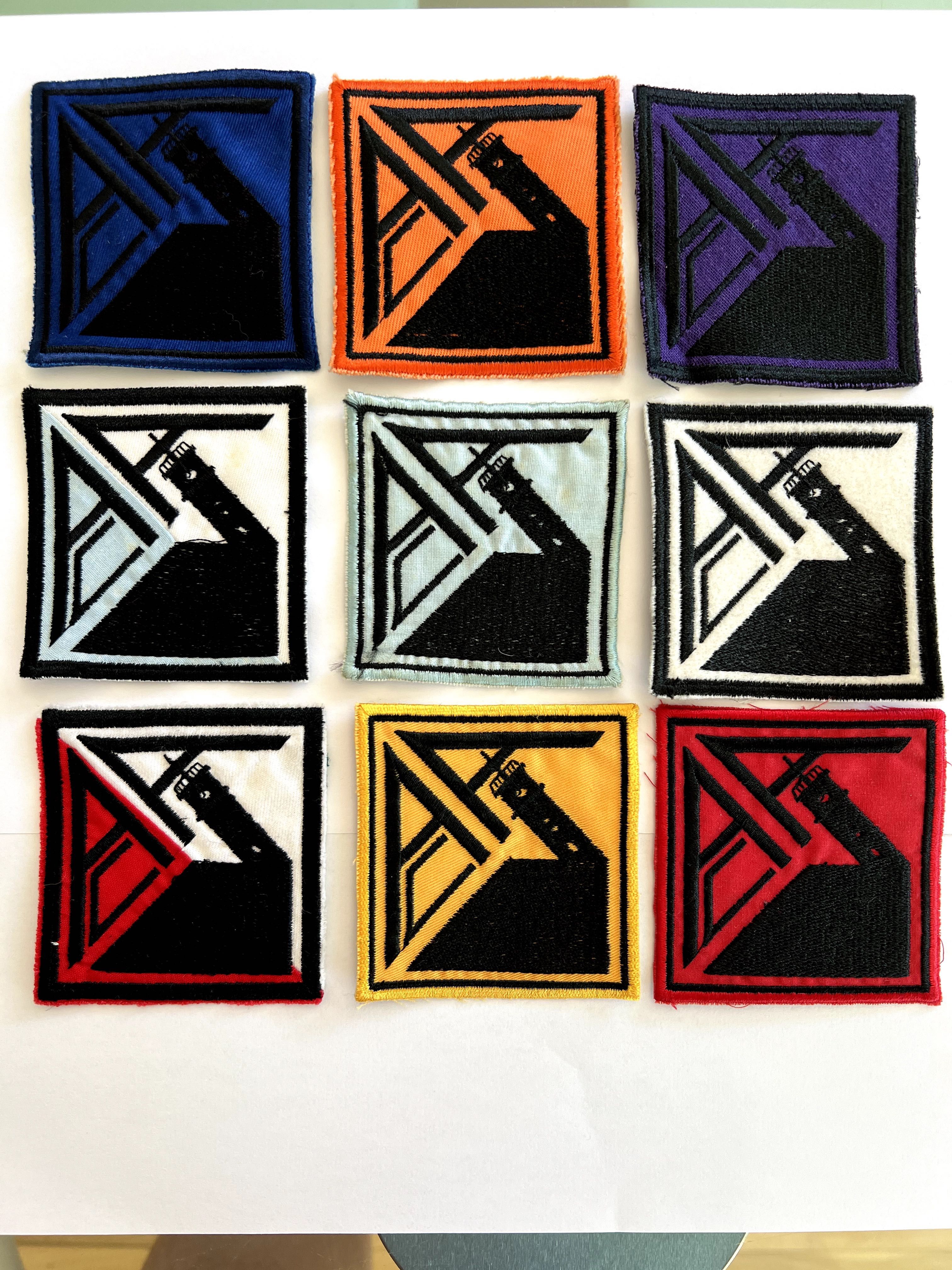 Conjunto de 9 emblemas da Associação Académica de Coimbra