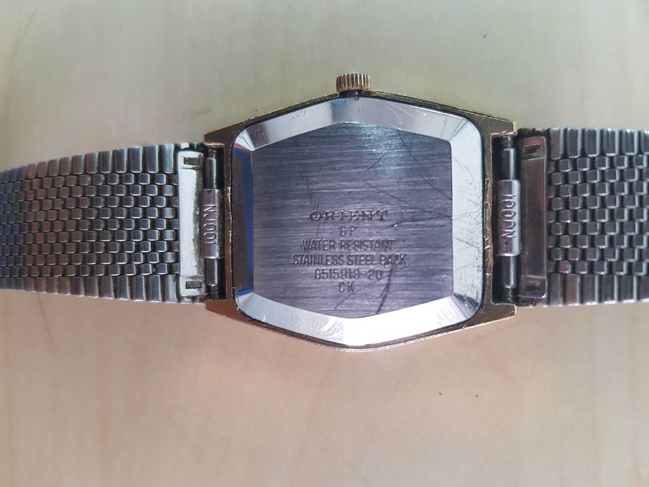 Zegarek nareczny ORIENT Quartz GP sprawny kolor zloty i czarny