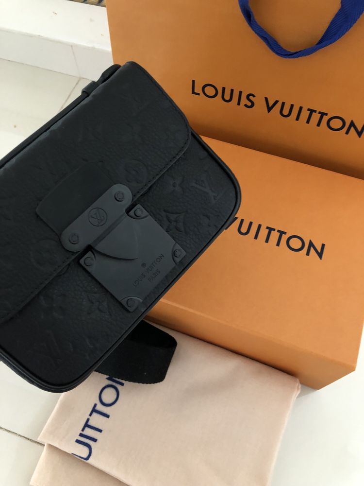 Saszetka Louis Vuitton skóra naturalna