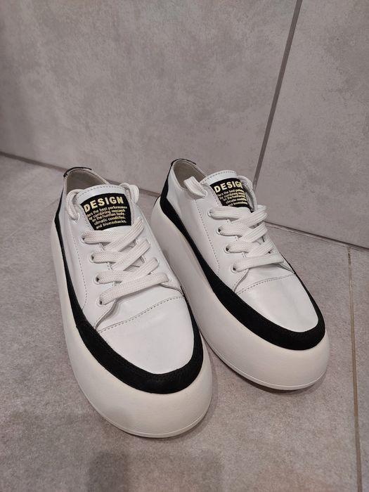 Білі шкіряні кеди