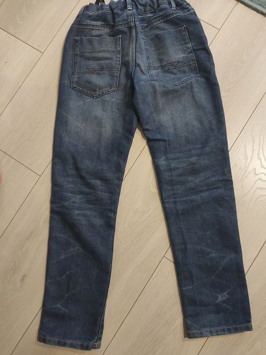 Spodnie jeansy  152