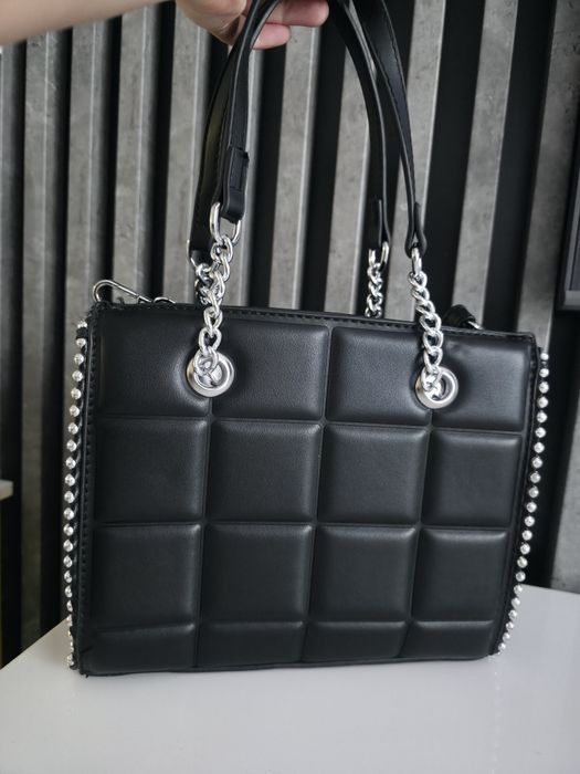 Elegancka pikowana torebka do ręki i przez ramię