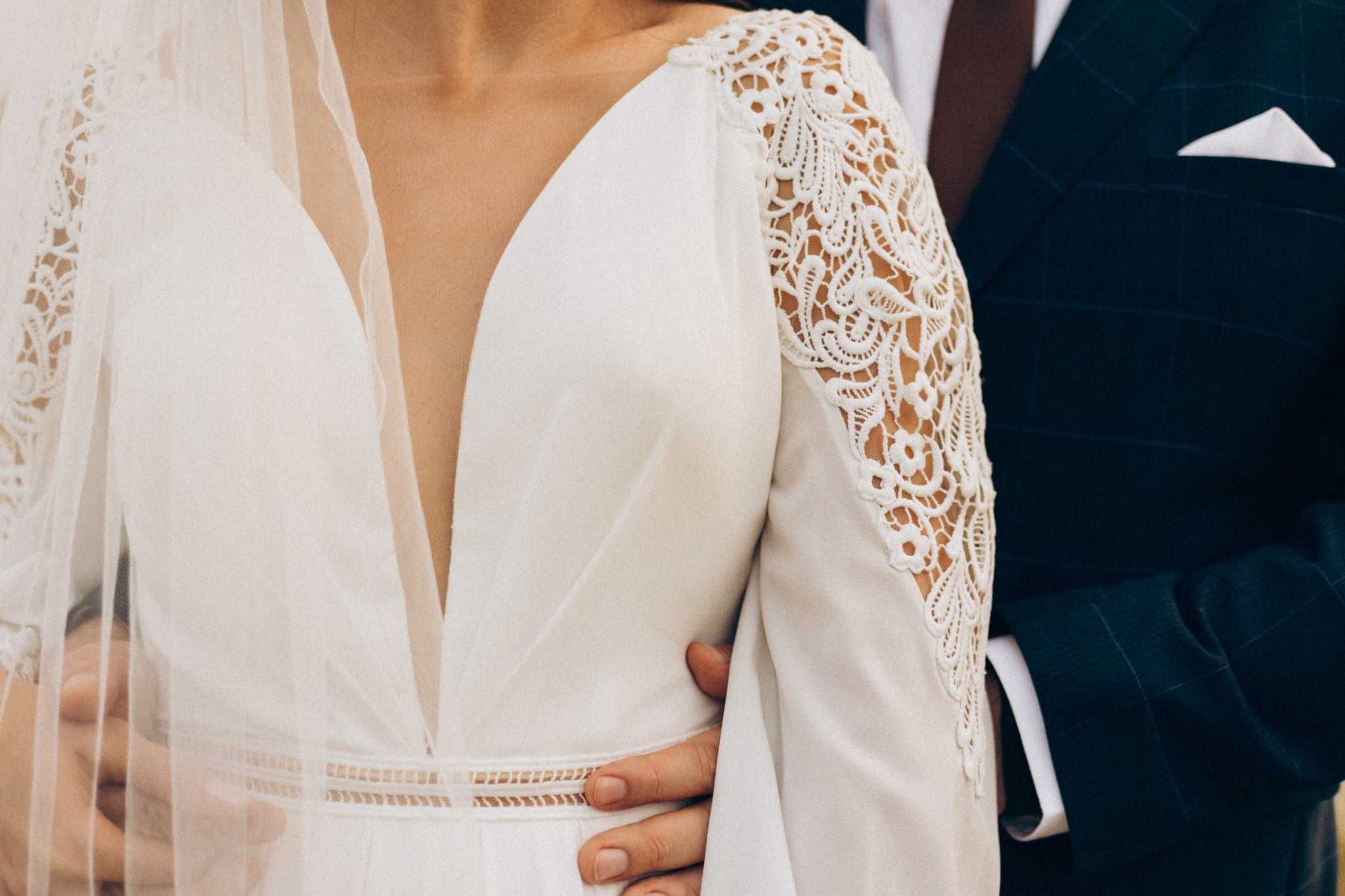 Elegancka biała suknia ślubna z długim rękawem rozmiar 38