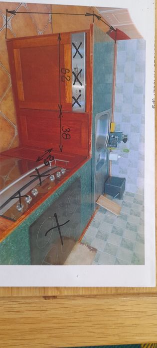 meble kuchenne z okapem stołem i krzesłami