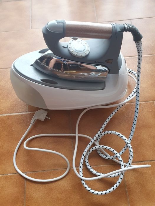 Ferro engomar a vapor