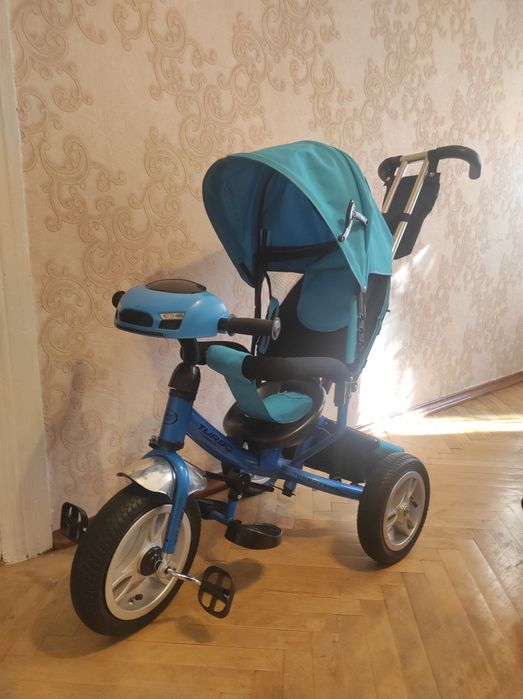 Триколісний велосипед з батьківською ручкою