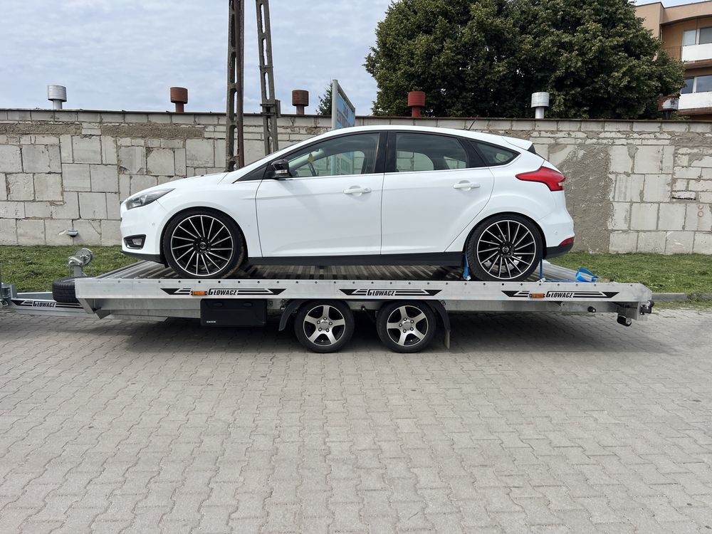 Wynajem laweta przyczepa do transportu samochodów pojazdów aut