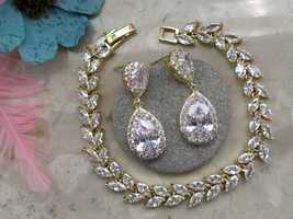 Elegancki złoty komplet ślubny kolczyki i bransoletka z kryształkami