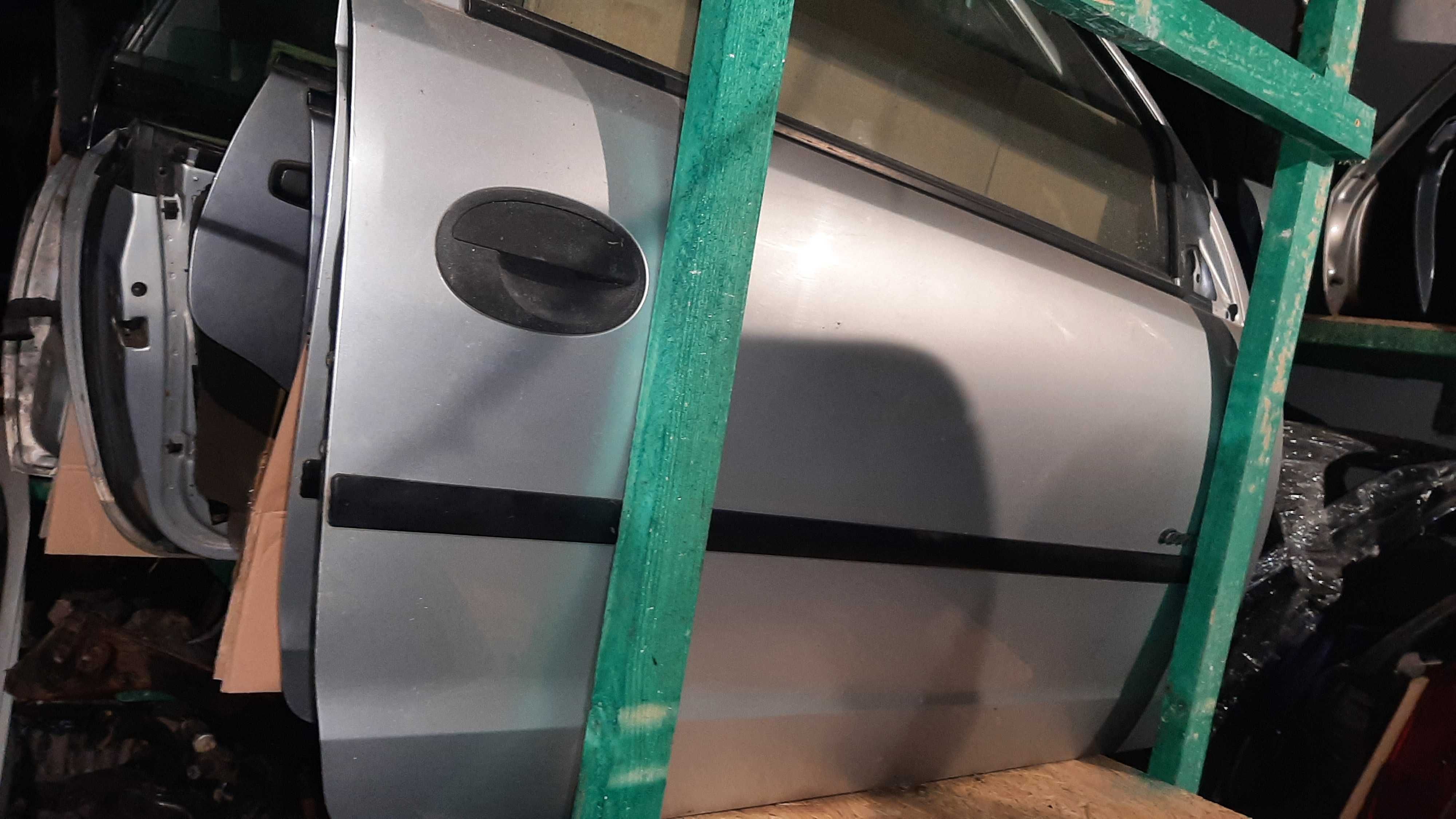 lak. Z147 opel corsa c drzwi prawe prawy przód 3 drzwi