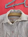 Antiga camisa de criança