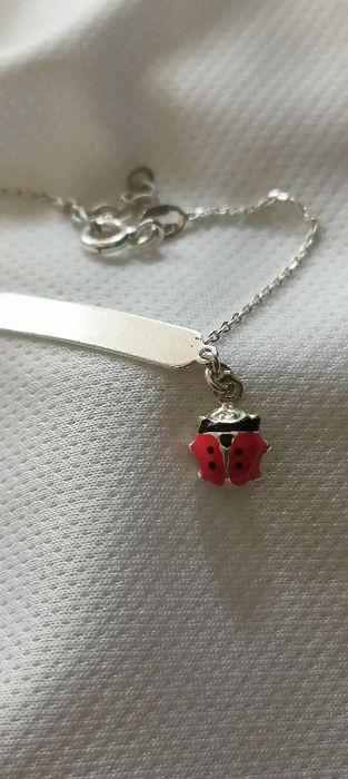 Pulseira criança em prata com chapa e joaninha