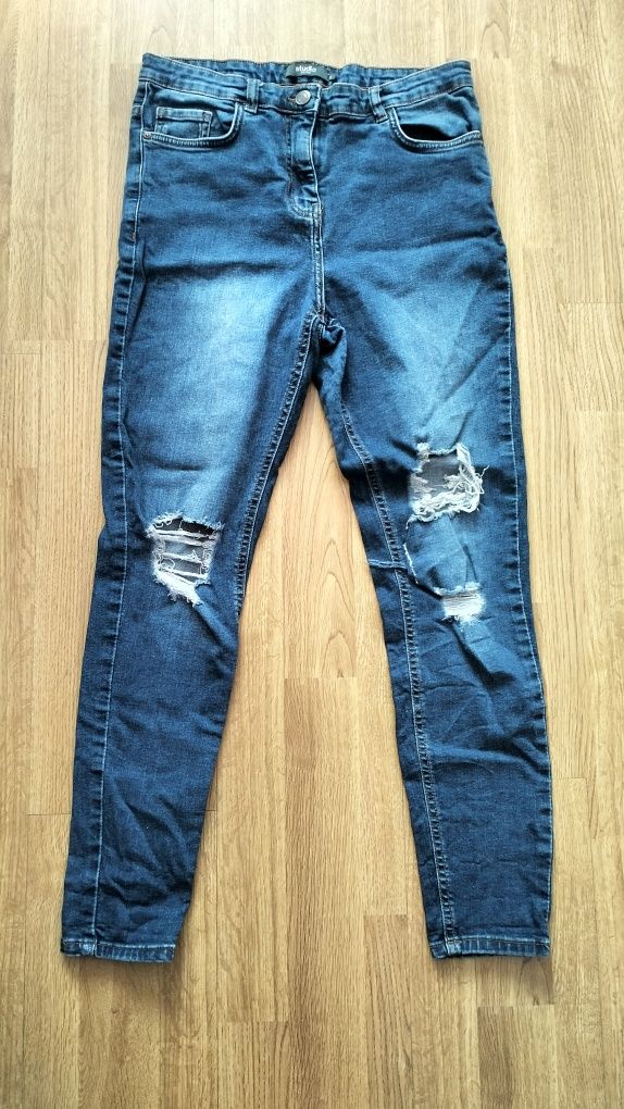 Spodnie denim z przetarciami dżinsowe spodnie