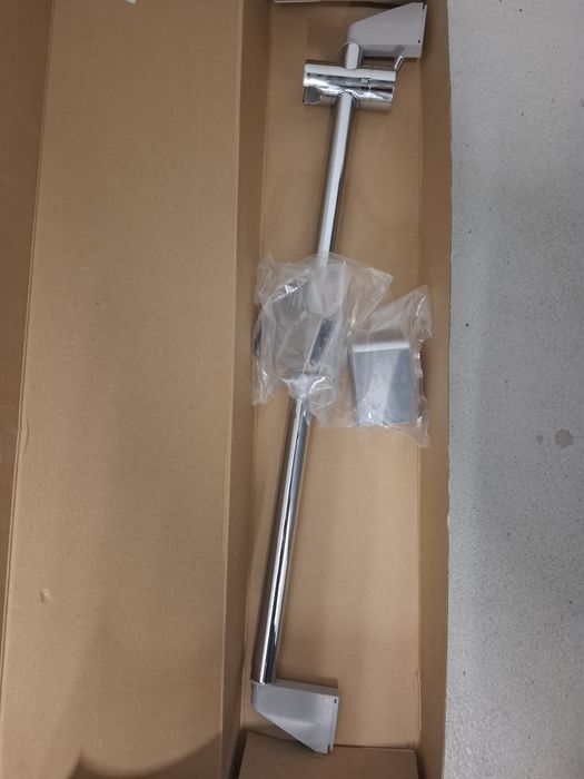 Uchwyt słuchawki prysznicowej Hansgrohe.