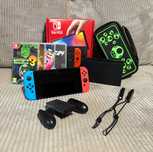 Nintendo Switch- Oled + 4 gry