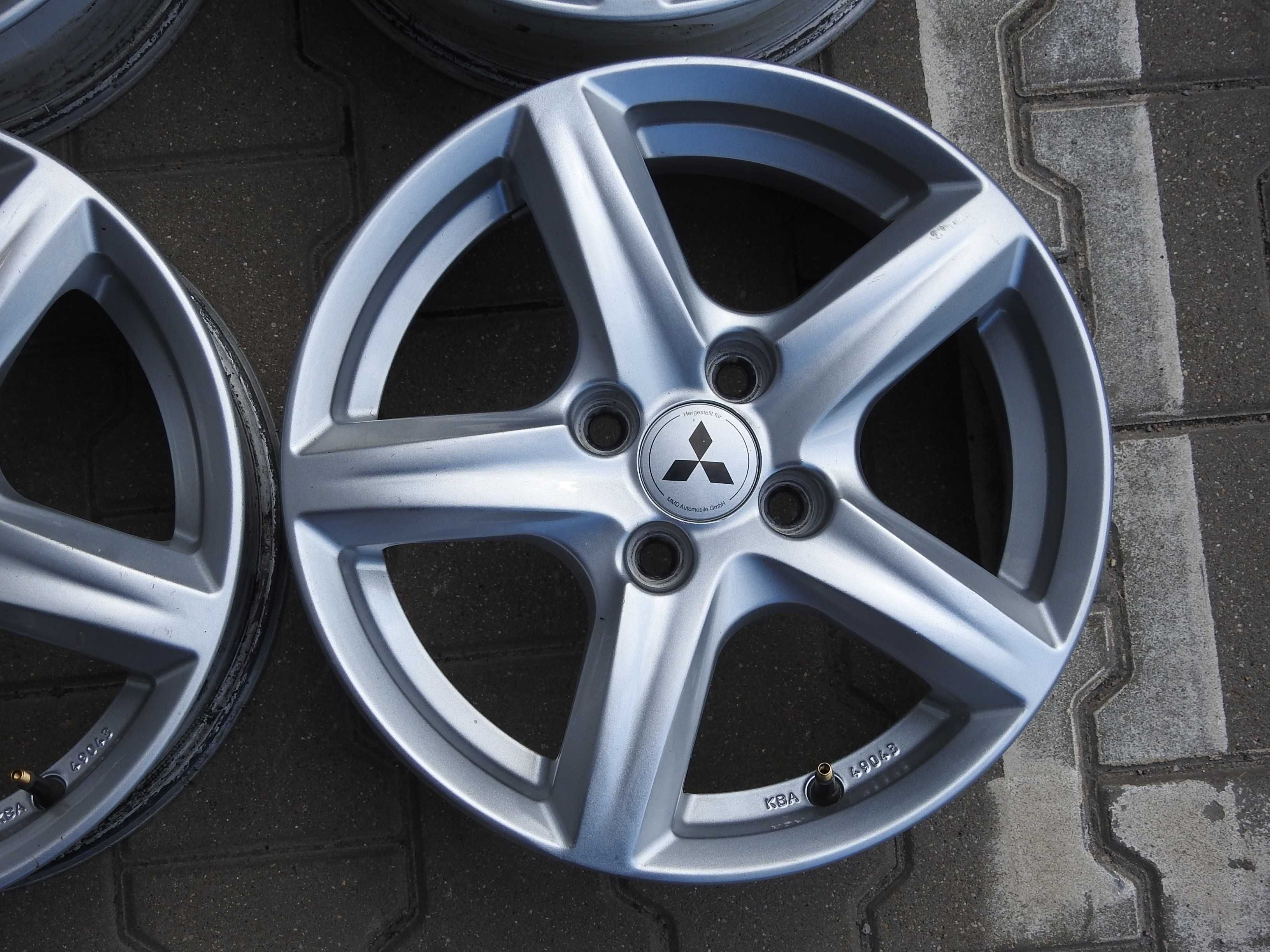 4x Alu 15'' 4x100 6J ET42 Piasta 56,1mm MITSUBISHI z czujnikami TPMS