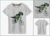 5.10.15  szary T-shirt z dinozaurem na rowerze