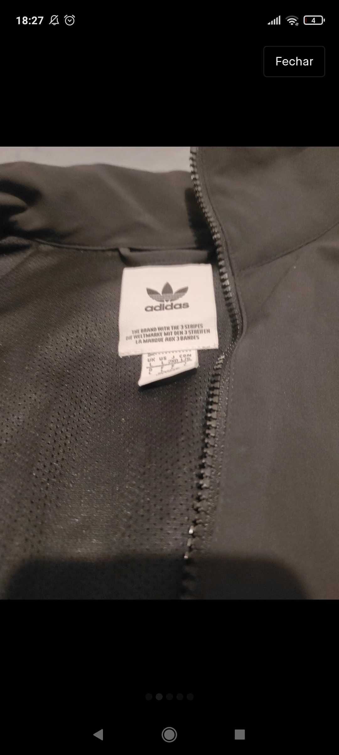 Casaco preto e branco da adidas