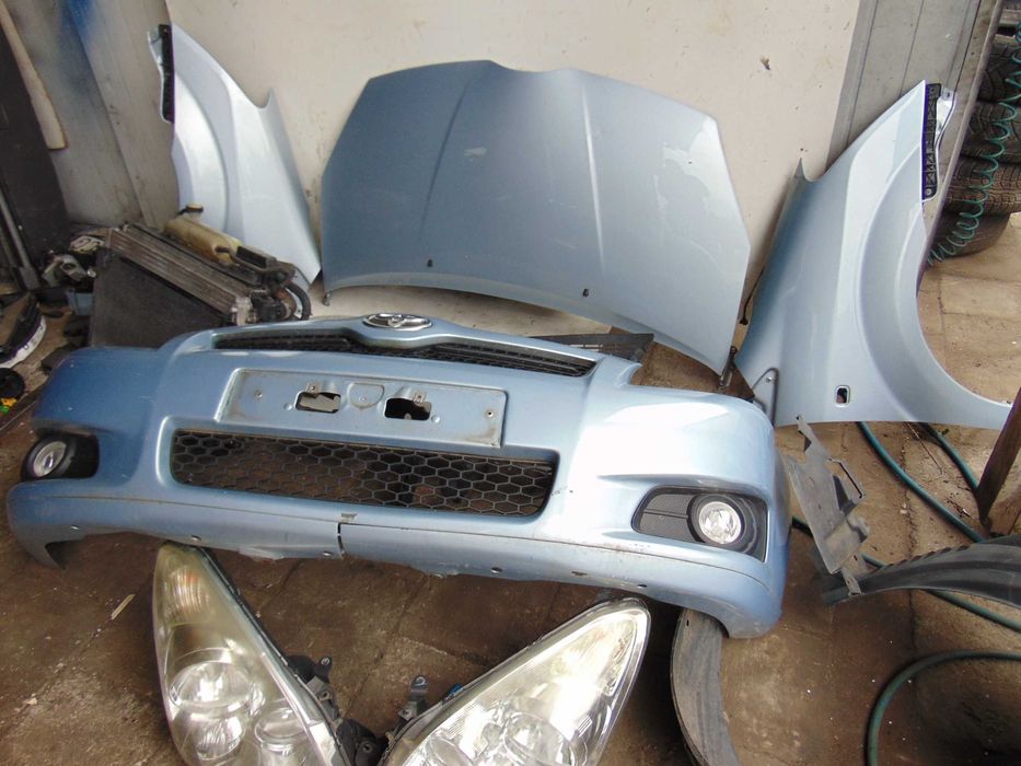 Zestaw Maska Zderzak Błotniki Lampy Chłodnice Toyota Corolla Verso II