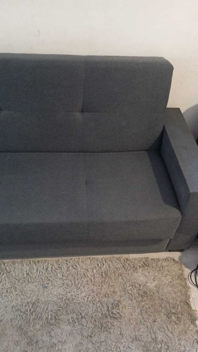 O sofá c/ arrumador