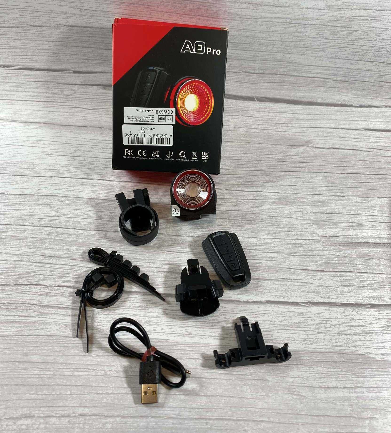 Задний фонарик на велосипед с сигнализацией и USB зарядка пульт ду