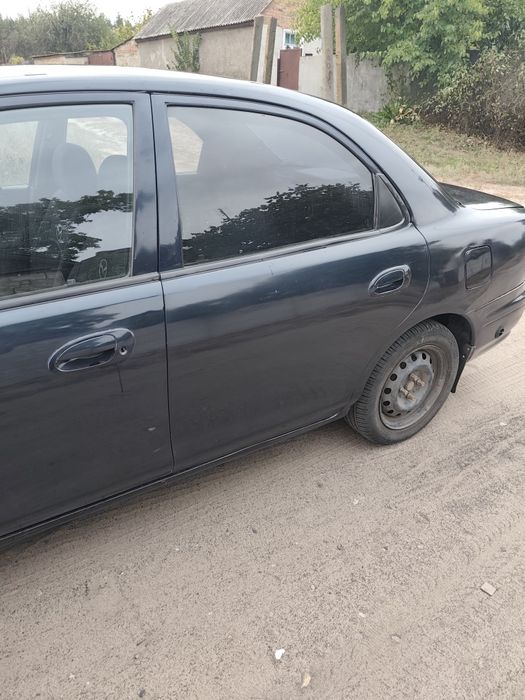 Mazda 323 1998 год