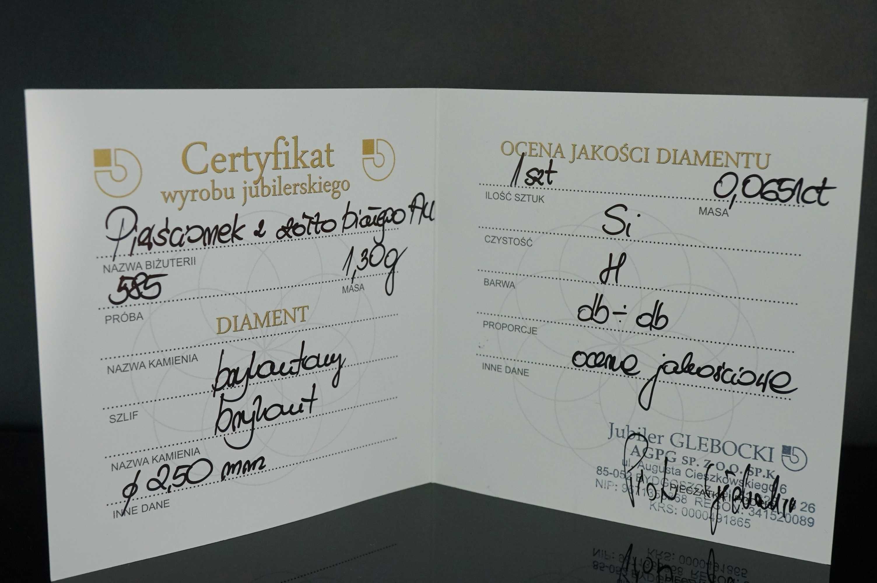 Złoto 585 - złoty pierścionek z Diamentem. Rozm 19