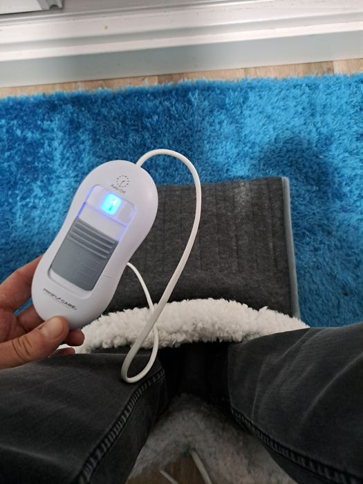 Aquecedor para pés elétrico