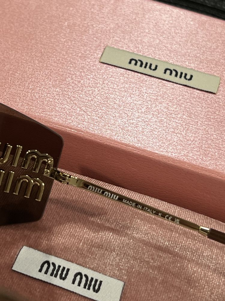 Okulary przeciwsłoneczne Miu miu + opakowania