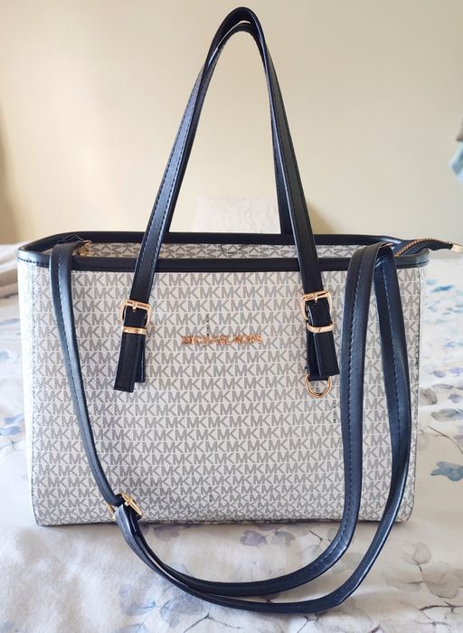 Conjunto de mala e carteira Michael Kors