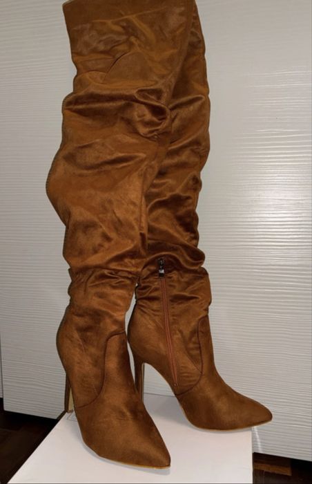 Botas cano alto enrugado