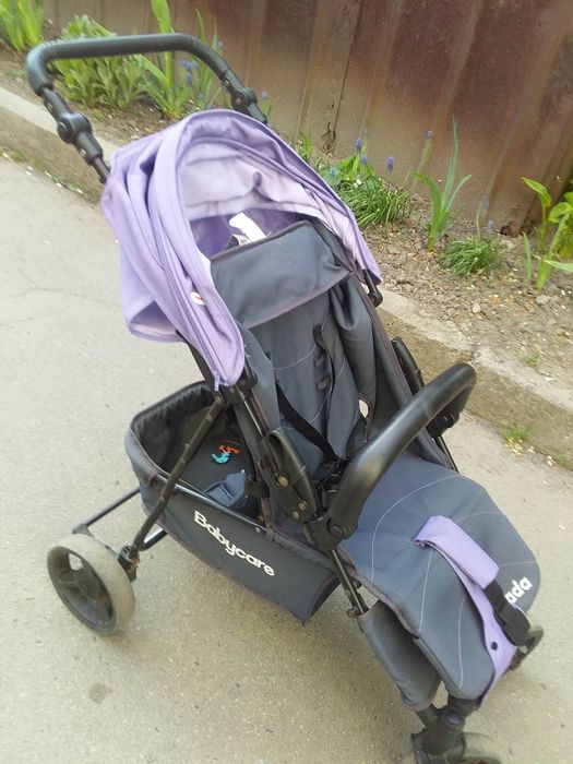 Дитяча прогулянкова коляска