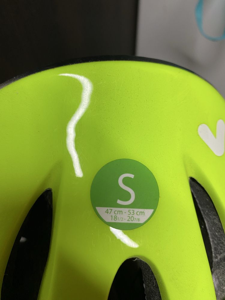Kask rowerowy zółtozielony.