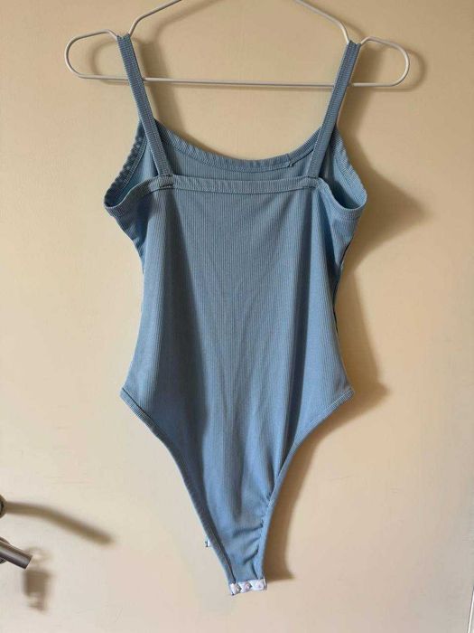 Body azul claro, tamanho S/M