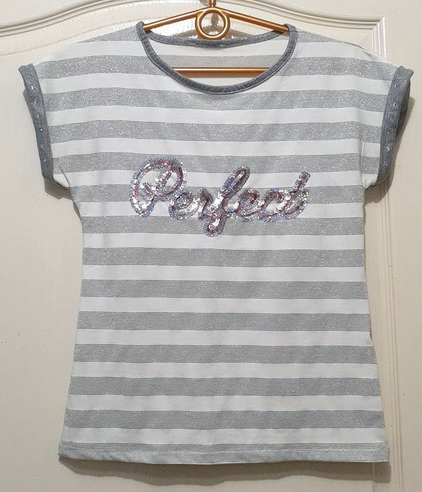 Футболки для девочки много