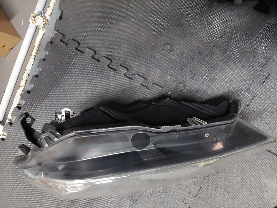 farol esq Opel Astra h