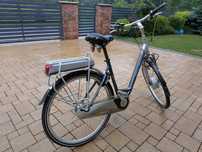 Rower elektryczny Trek Navigator L300+ miejski unisex męski damski