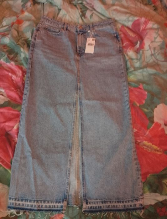 Джинсова спідниця .