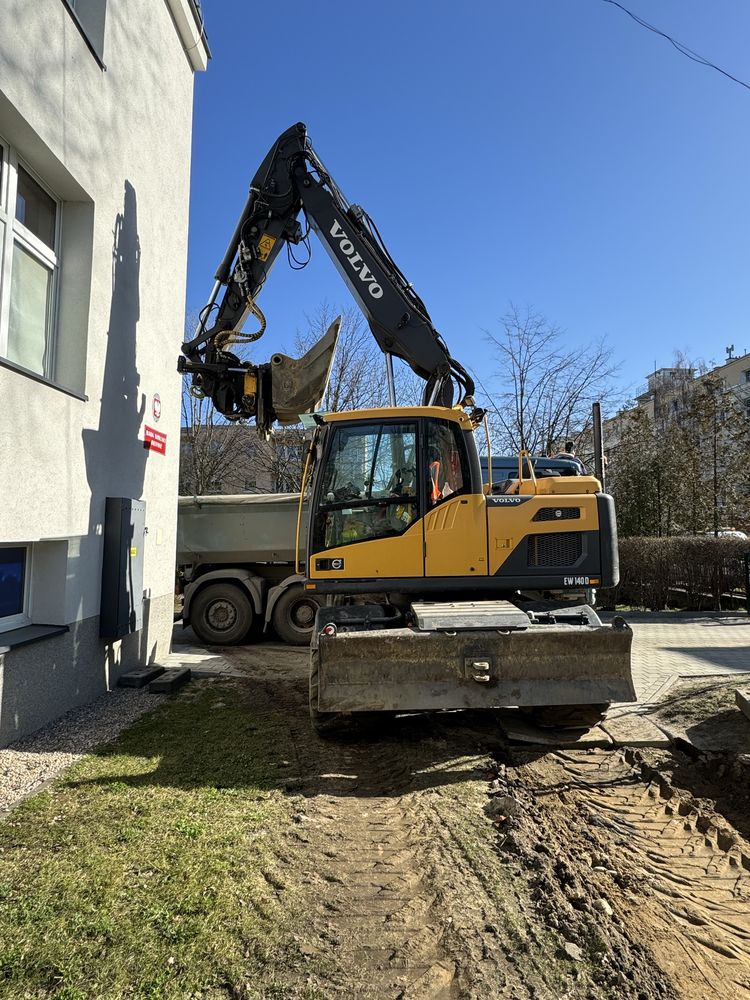 Prace ziemne usługi koparka kołowa z przyczepką rotor widły chwytak