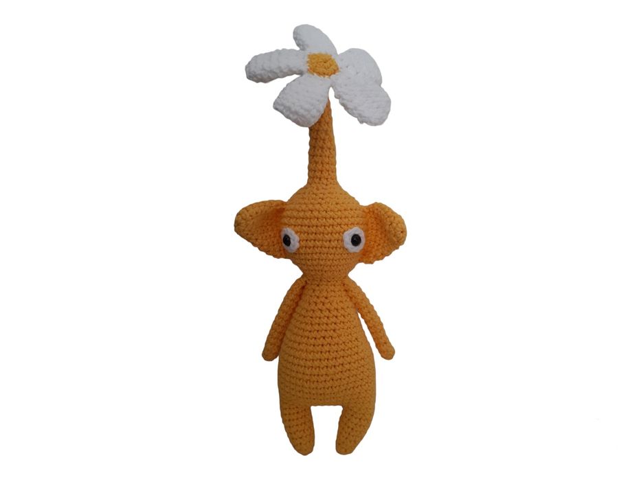 Pikmin amarelo com flor em crochet amigurumi